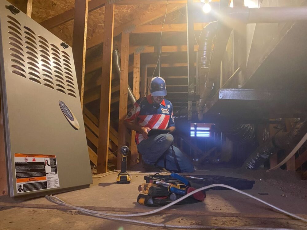 Autumn Air technician servicing a heater